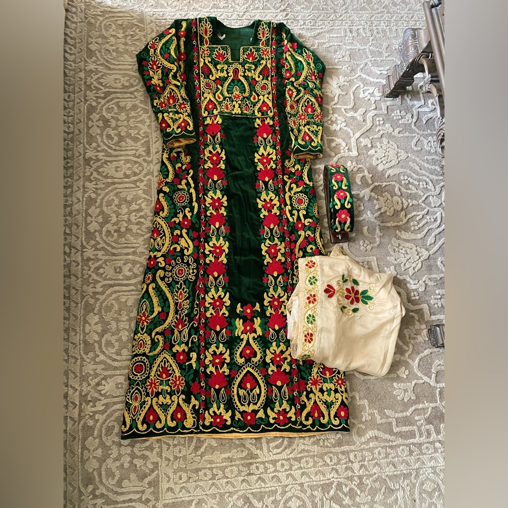 Hand made machine embroidered Palestinian thobes